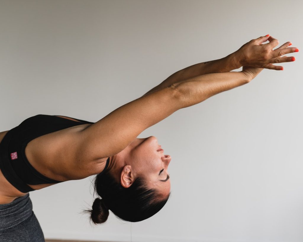 woman-stretching-arms-aksjqnem75y